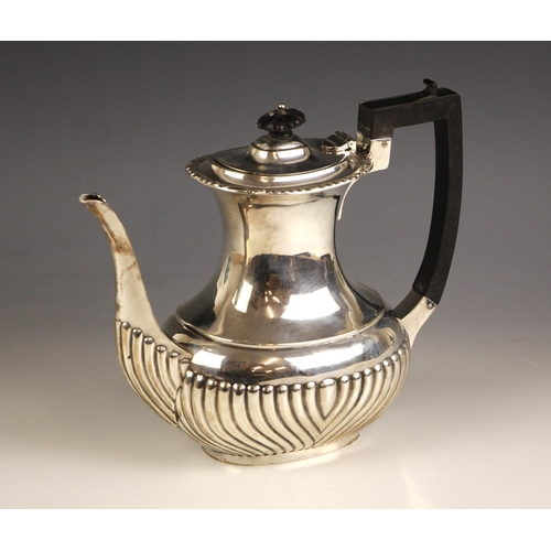 90 - An Edwardian silver coffee pot, William Mammatt and Son, Sheffield 1905, the cast floral rims above ... 