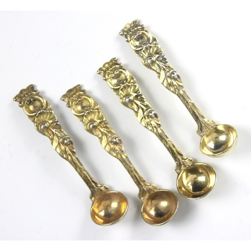 98 - A set of four William IV silver gilt ladles, Randall Chatterton, London 1834, the cast floral termin... 