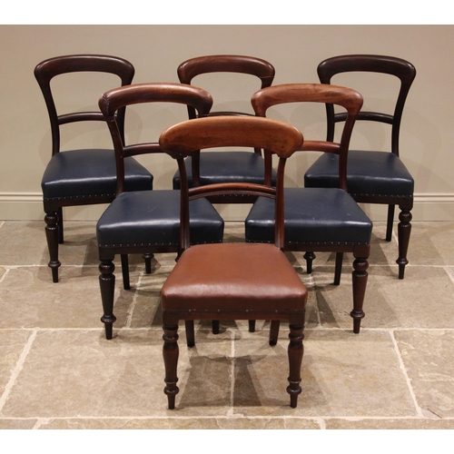 996 - A matched set of twelve Victorian mahogany buckle back dining chairs, each with a straight front pad... 