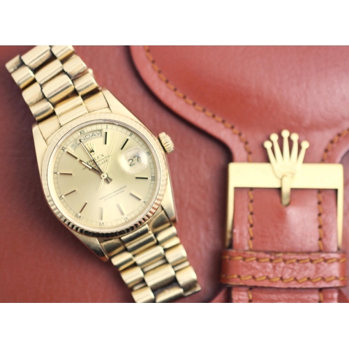 189 - A gentleman's 18ct gold Rolex Oyster Perpetual Day-Date wristwatch, the round gold-toned dial with b... 