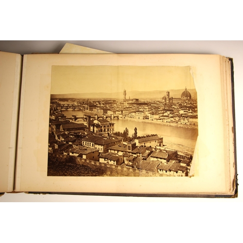 419 - A large format photograph album, late 19th/early 20th century, depicting topographical, historical, ... 