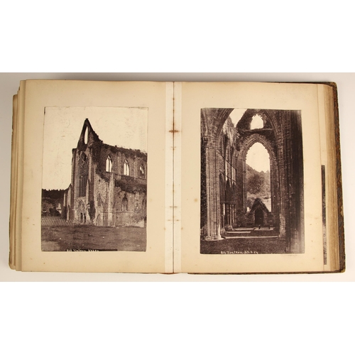 419 - A large format photograph album, late 19th/early 20th century, depicting topographical, historical, ... 