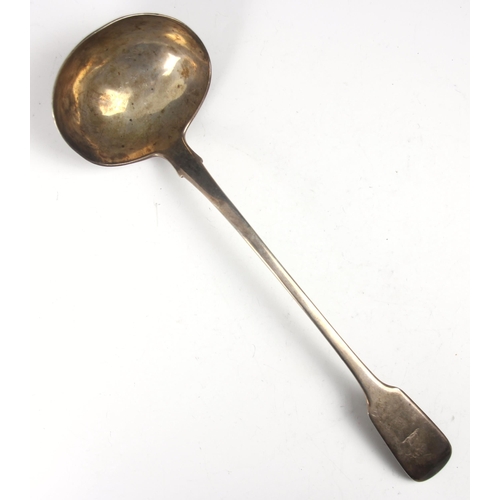 95 - A George IV silver fiddle pattern soup ladle, William M Traies, London 1825, of typical form with cr... 