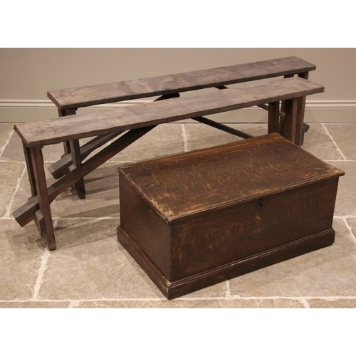 1022 - A near pair of pine benches, early 20th century, of rectangular form upon trestle type supports, 52c... 