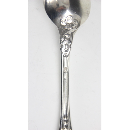 78 - A set of sixteen 19th century French silver teaspoons, the scrolling decorated spoon with initial to... 