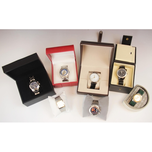 197 - A selection of vintage boxed watches, including an Ellesse watch, upon a green leather style strap, ... 