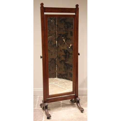 1043 - An Edwardian mahogany cheval mirror, the supporting frame outlined with inlaid stringing and swags, ... 