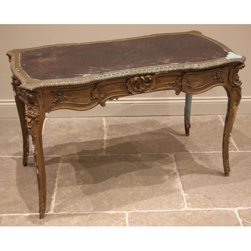 987 - An Italian carved wood and gesso bureau plat, 18th/19th century, the shaped top inset with a skiver,... 