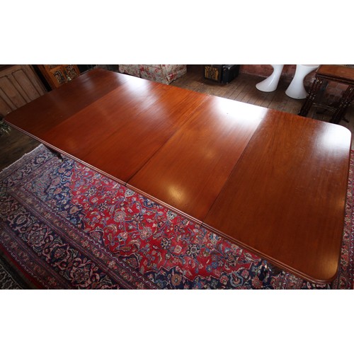 1005 - Victorian mahogany extending dining table, with three additional leaves, the rectangular moulded top... 