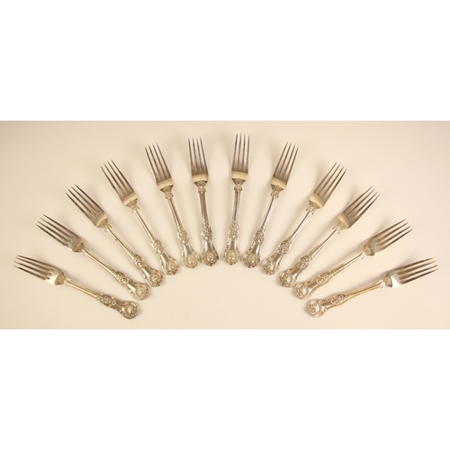 12 - A set of twelve Victorian silver Queens pattern dessert forks, Chawner and Co, London 1861, of typic... 