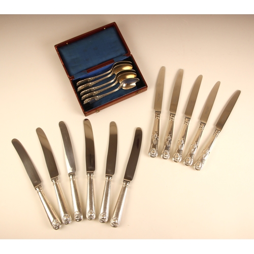 18 - A set of five Kings pattern silver coloured table knives, 23cm long, with a set of six silver colour... 