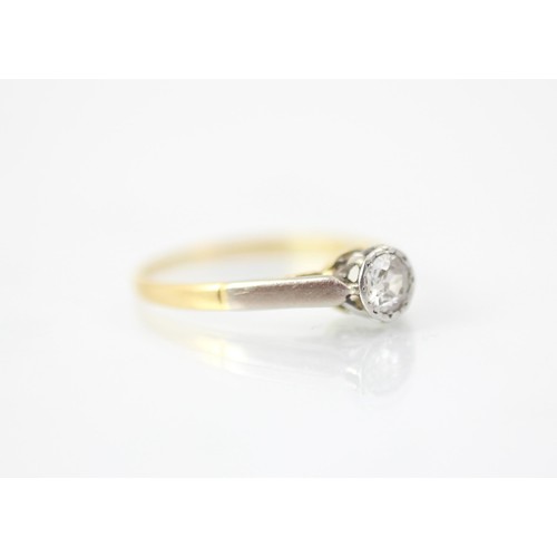 229A - A 20th century diamond solitaire ring, the old cut diamond within white metal rub over mount with co... 