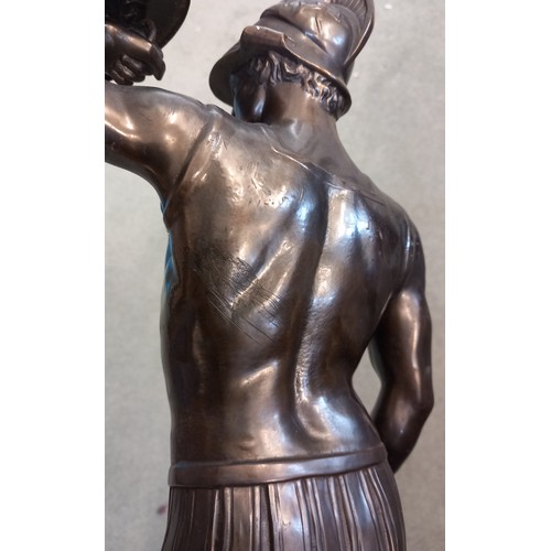 400 - Two Art Deco influence bronze patinated spelter figures, 20th century, each modelled as a Roman sold... 