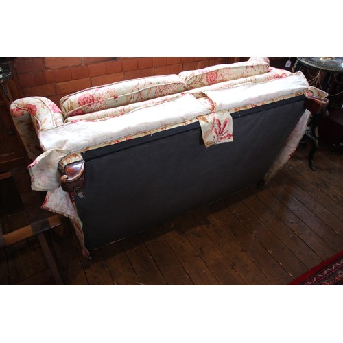 993 - A two seater sofa, late 19th/early 20th century, of cottage proportions, later re-covered in floral ... 