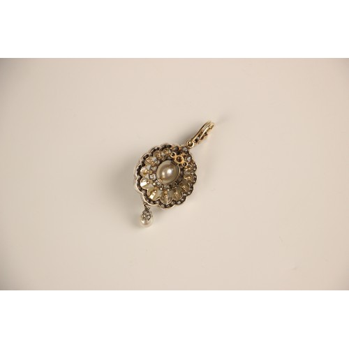 319 - An early 20th century diamond and 'pearl' pendant or brooch, the central 'pearl' surrounded by eleve... 