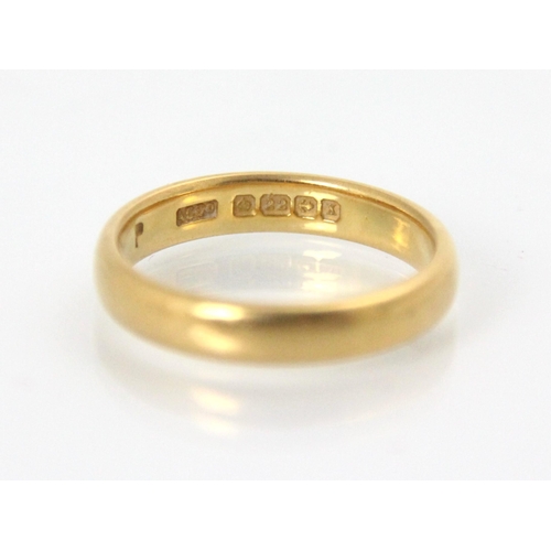102 - A 22ct wedding band, stamped ACCo, Birmingham 1922, ring size P 1/2, 5.9gms