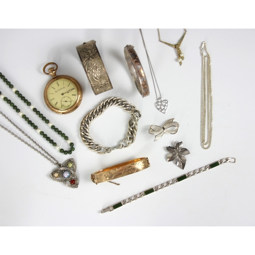 120 - A selection of costume jewellery, including a rolled gold, hinged bangle with engraved detail (at fa... 