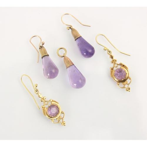 138 - A suite of amethyst jewellery, comprising pair of earrings and pendant, the plain polished amethyst ... 