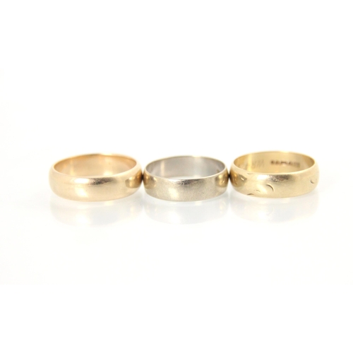 157 - A 9ct yellow gold wedding band, stamped 'HS' Birmingham 1965, ring size O, with a further 9ct yellow... 