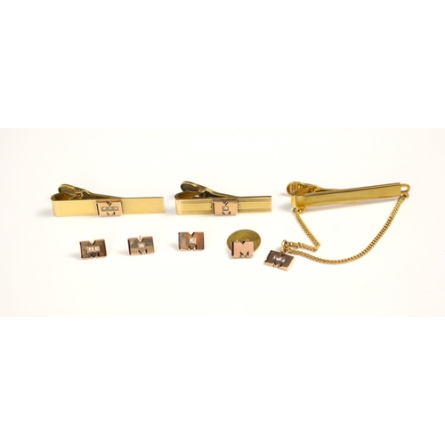 170 - A selection of yellow metal and gold coloured jewellery, including three diamond set 'M' dress studs... 