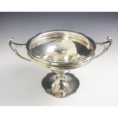 3 - A George V silver rose bowl, Walker and Hall, Sheffield 1914, the twin handles with scroll thumbpiec... 
