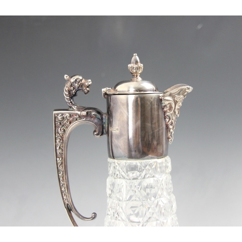 4 - A silver mounted claret jug, Francis Howard Ltd, Sheffield 1990, the hinged cover with an acorn fini... 
