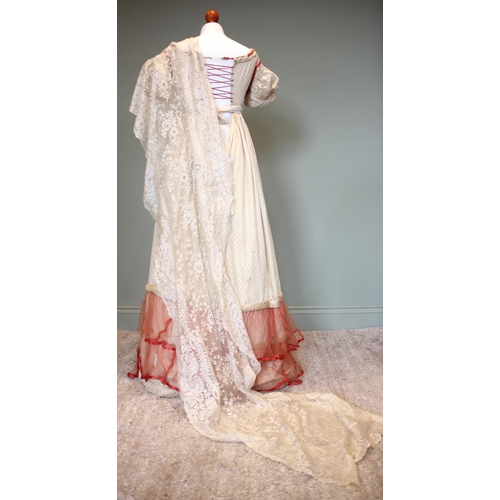 sachin and babi light blue dress A Regency cream figured silk evening dress, circa 1815-1820, the short  sleeves with ivory silk puffs