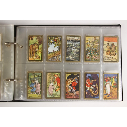 483 - A collection of cigarette and tea cards to 35 albums (one empty), to include forty eight Chinese or ... 