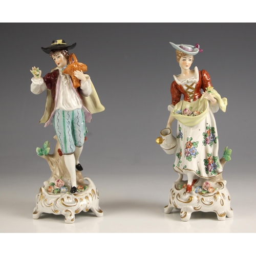 577 - A pair of Sitzendorf porcelain figures, late 19th century, modelled as a courting lady and gentleman... 