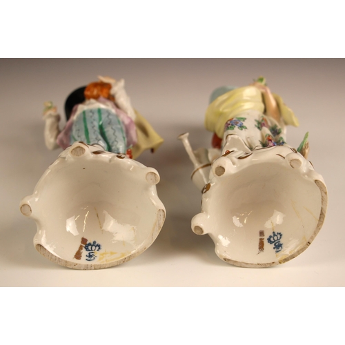 577 - A pair of Sitzendorf porcelain figures, late 19th century, modelled as a courting lady and gentleman... 