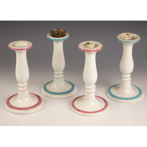 578 - A set of four Wedgwood candlesticks, 19th century, each of baluster form, raised upon a spreading ci... 