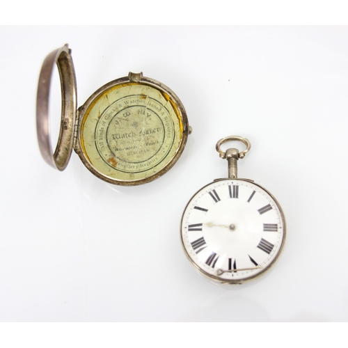 63 - A George III silver pair cased pocket watch, stamped for London 1815, the white enamel dial with Rom... 