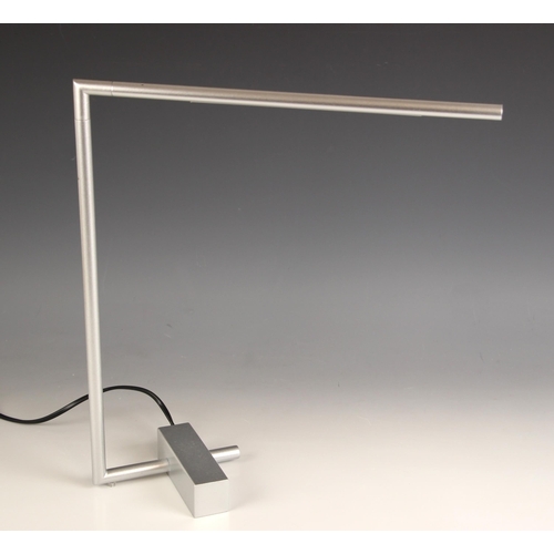 639 - A Heals of London saber desk lamp, with adjustable arm, silver finish, 40cm high

Lighting lots are ... 