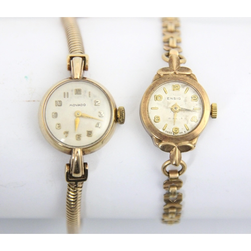 68 - A ladies 9ct Movado wristwatch, the circular white dial with Arabic numerals, set to a plain polishe... 