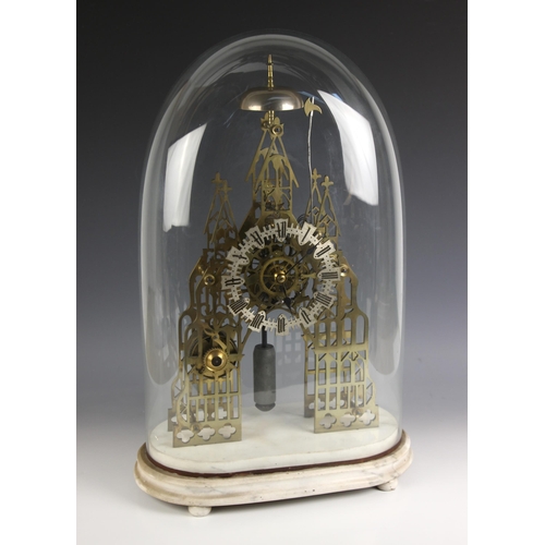 731 - A Victorian brass eight day fusee skeleton clock, of Gothic architectural form, with overhead saucer... 