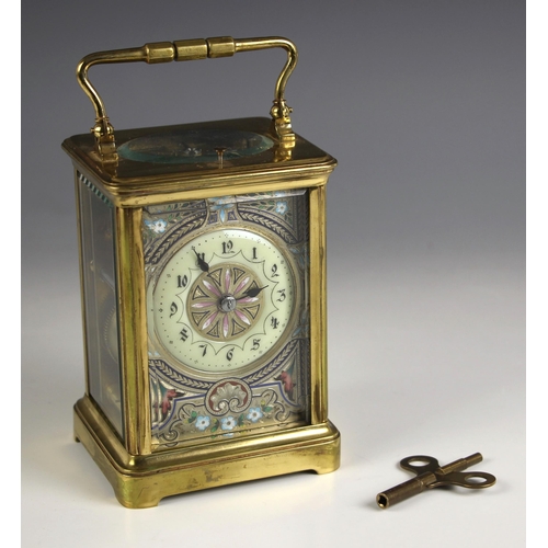 738 - A brass cased two train repeating carriage clock, late 19th century, the 7cm enamel dial with engine... 