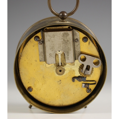 740 - An eight day brass cased GWR railway drum clock, by J.M Skarratt & Co, Paris, the 9cm white enamelle... 