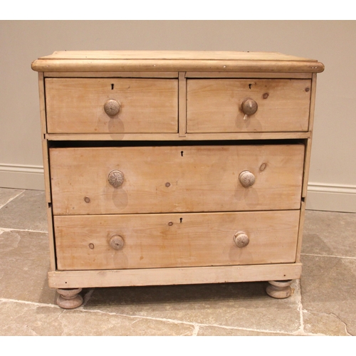 802 - A late 19th century pine chest of drawers, the rectangular moulded top with rounded front corners, o... 