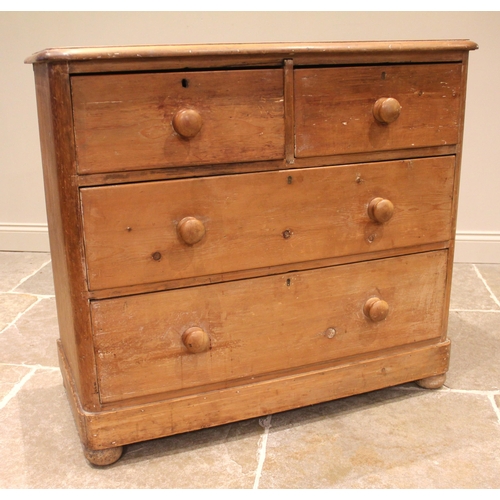 803 - A late 19th century pine chest of drawers, formed with two short over two graduated long drawers, up... 