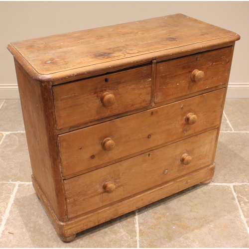 803 - A late 19th century pine chest of drawers, formed with two short over two graduated long drawers, up... 