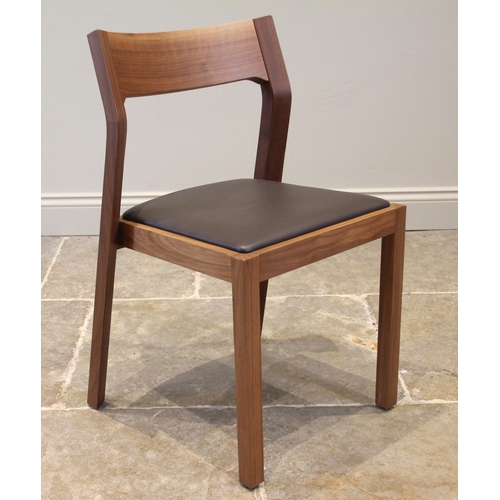 846 - A Case Umbra walnut chair, the concave back rest upon angled supports over a padded seat and foreleg... 