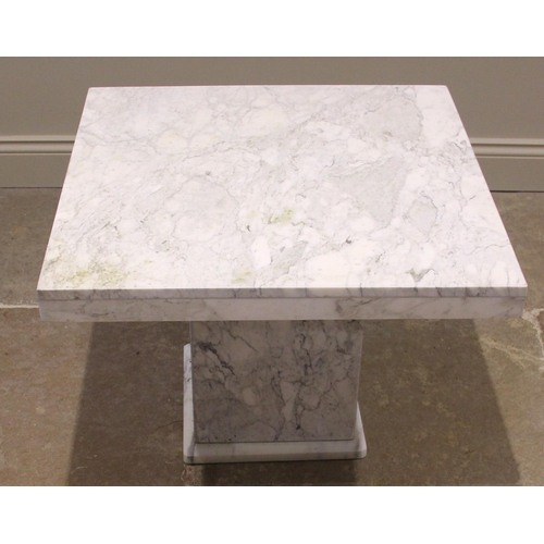 855 - A contemporary variegated white marble centre table, the square top upon a cubic pedestal and integr... 