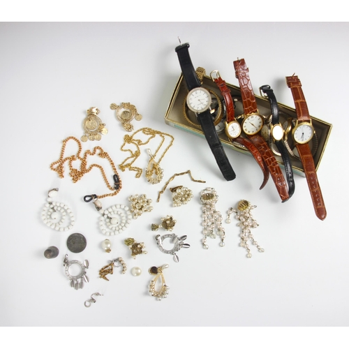92 - A selection of costume jewellery and watches, including gold plated curb link chain, a gold coloured... 