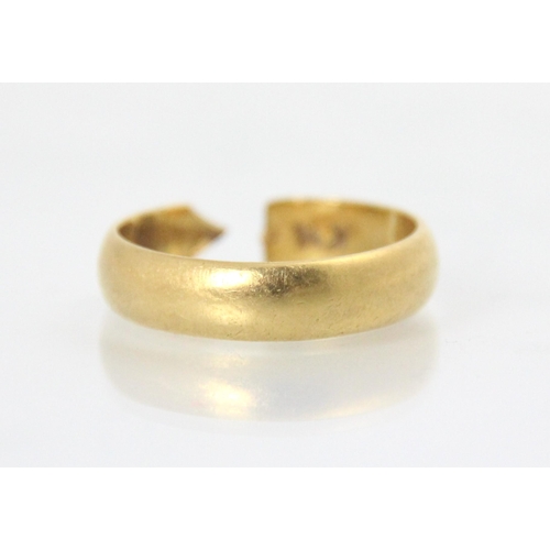 99 - A yellow metal wedding band, stamped Birmingham 1969, 5gms (at fault)