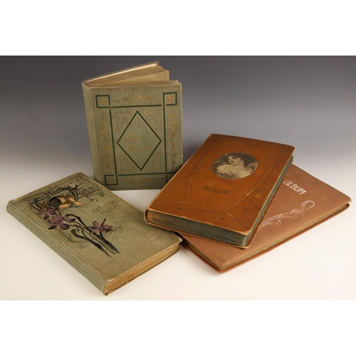 486 - A collection of over five hundred Edwardian era postcards to four Art Nouveau albums, to include Fre... 