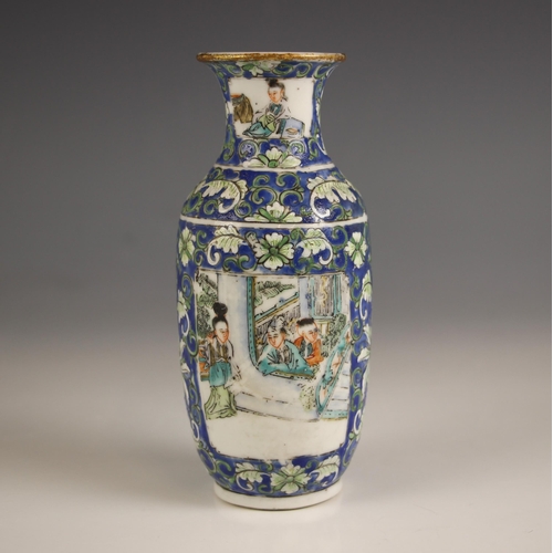 573 - A Chinese porcelain rouleau vase, 19th century, decorated with floral sprays against a blue ground a... 