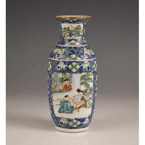 573 - A Chinese porcelain rouleau vase, 19th century, decorated with floral sprays against a blue ground a... 