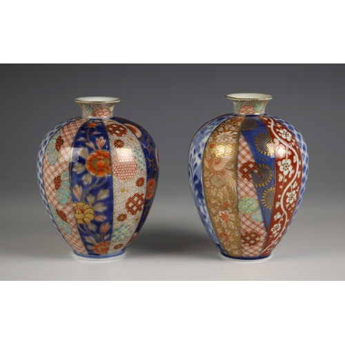 575 - A pair of Japanese Imari porcelain vases, Meiji period (1868-1912), each of ovoid form and decorated... 