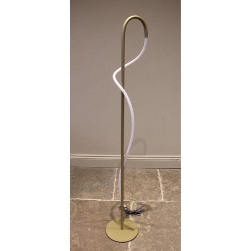 636 - A modern Heals Of London 'Wave' LED floor lamp in satin gold finish, of sinuous form on circular bas... 