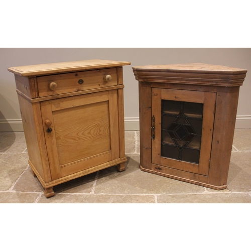 809 - A Victorian and later pine side cupboard, formed with a moulded top over a single drawer and a panel... 